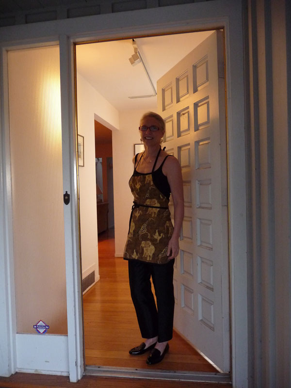 Answering-The-Door-In-Cooking-Apron