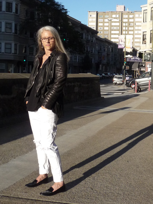 Middle-Aged-Lady-In-Biker-Jacket-And-Distressed-White-Jeans-After-Labor-Day