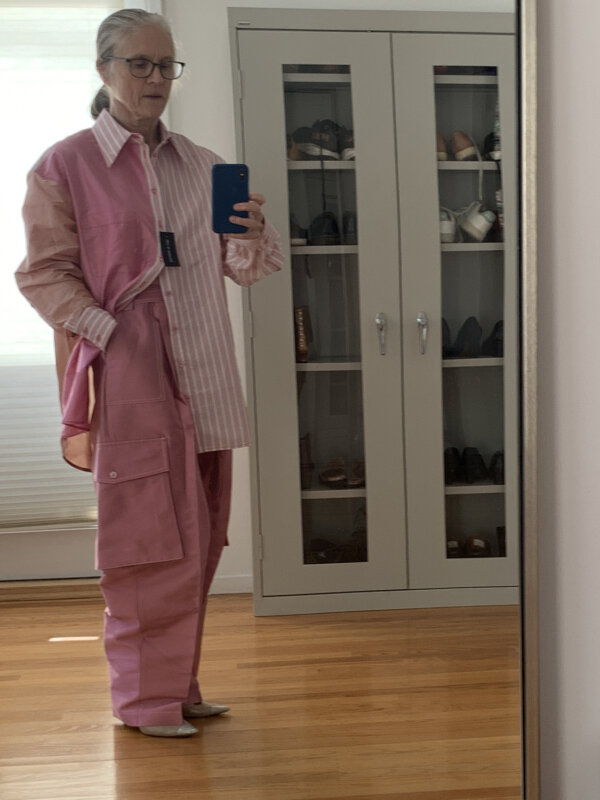 Christopher John Rogers pink silk satin cargo pants and striped shirt