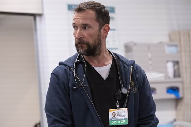 Noah Wyle in The Pitt, in scrubs with a stethoscope around his neck