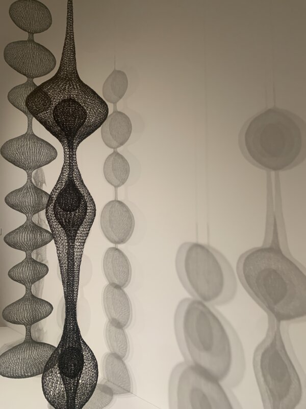 Wire forms by Ruth Asawa hanging at the SFMOMA